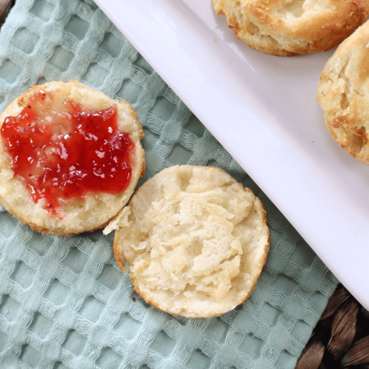 Golden, flaky homemade Popeye's-style biscuits fresh from the oven.