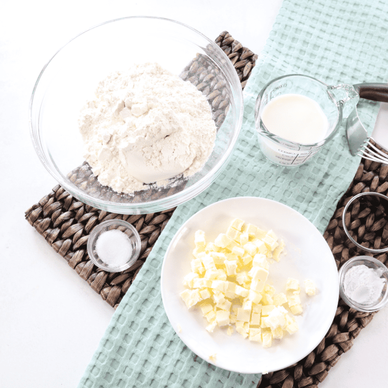 Ingredients needed for Copycat Popeye's Biscuits Recipe on kitchen table.