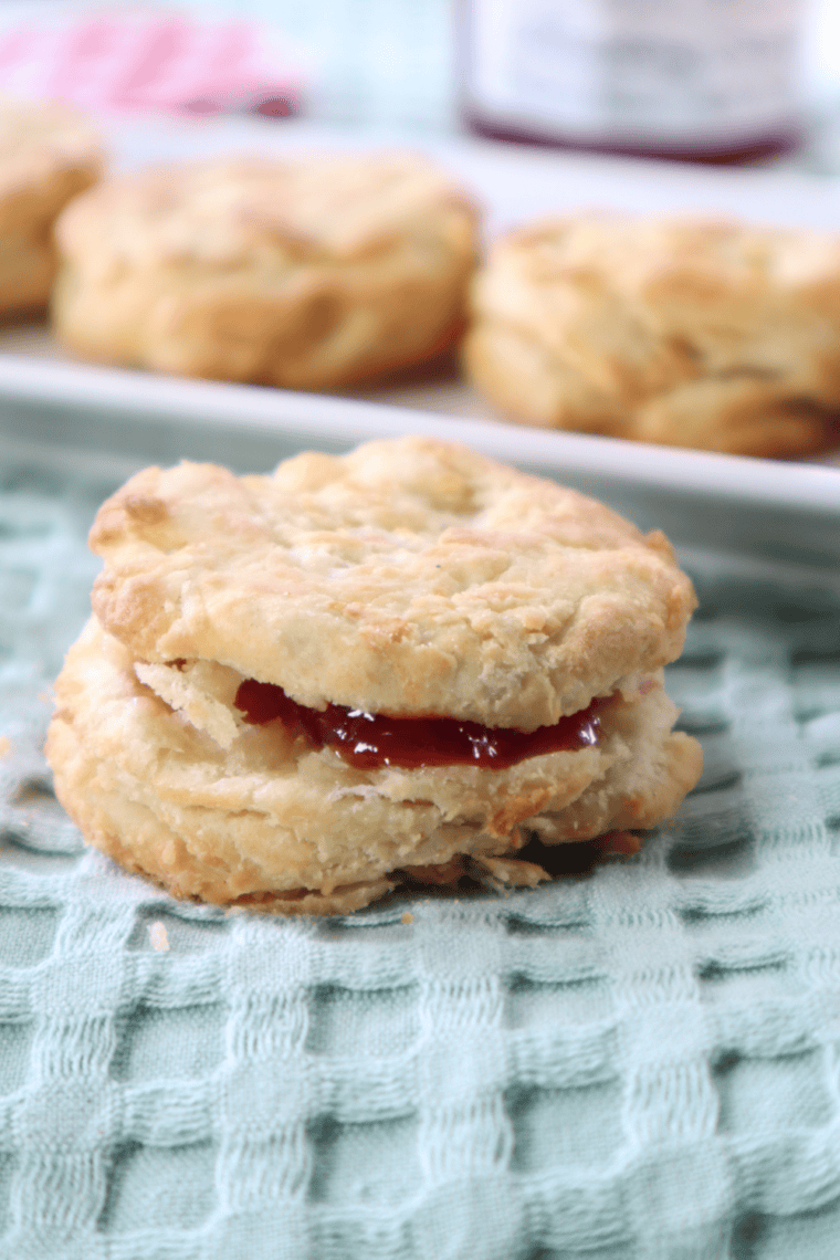 Golden, flaky homemade Popeye's-style biscuits fresh from the air fryer, ready to serve.