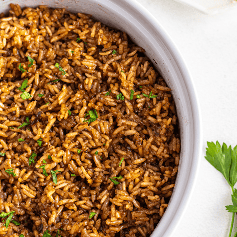 Serving of Copycat Popeyes Cajun Rice, seasoned with bold Cajun spices and perfect for any meal.