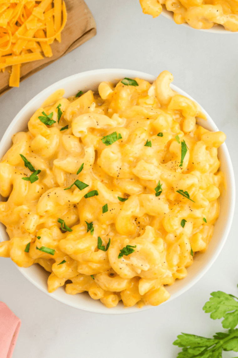 Mike’s Farm Macaroni and Cheese served with a golden, crispy cracker topping, creamy cheese mixture, and tender pasta.