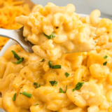 Mike’s Farm Macaroni and Cheese served in a bowl with a creamy cheese sauce and baked to perfection.