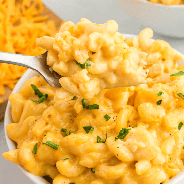 A hearty serving of Mike’s Farm Macaroni and Cheese, featuring golden buttery cracker topping and creamy, cheesy pasta.