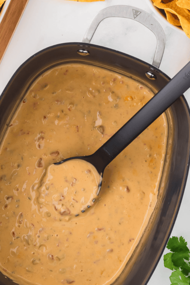 Close up of Ninja Possible Cooker Queso Dip cooked and being ready to serve.