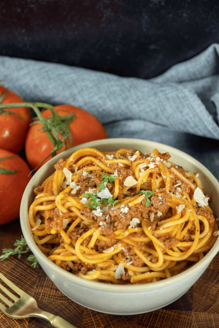 Olive Garden-style meat sauce with ground beef and Italian sausage, simmering in a savory tomato-based sauce.