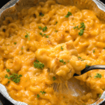 Bowl of homemade Popeyes Mac and Cheese, creamy, cheesy, and baked to golden perfection.