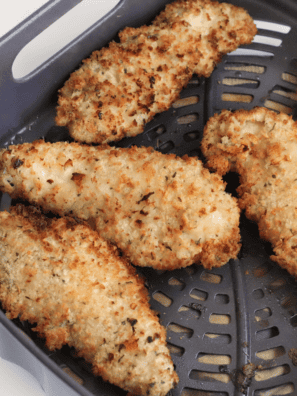 Homemade Texas Roadhouse Chicken Critters—crispy, golden-brown chicken tenders served with dipping sauces.