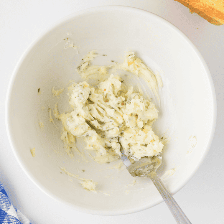 Stirring in nutritional yeast, parsley, salt, and optional seasonings.