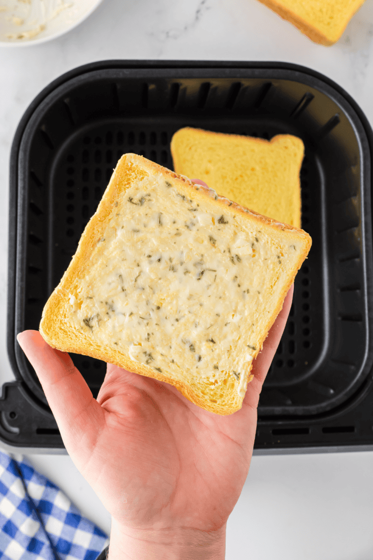 Vegan Garlic Butter with fresh herbs, nutritional yeast, and garlic.