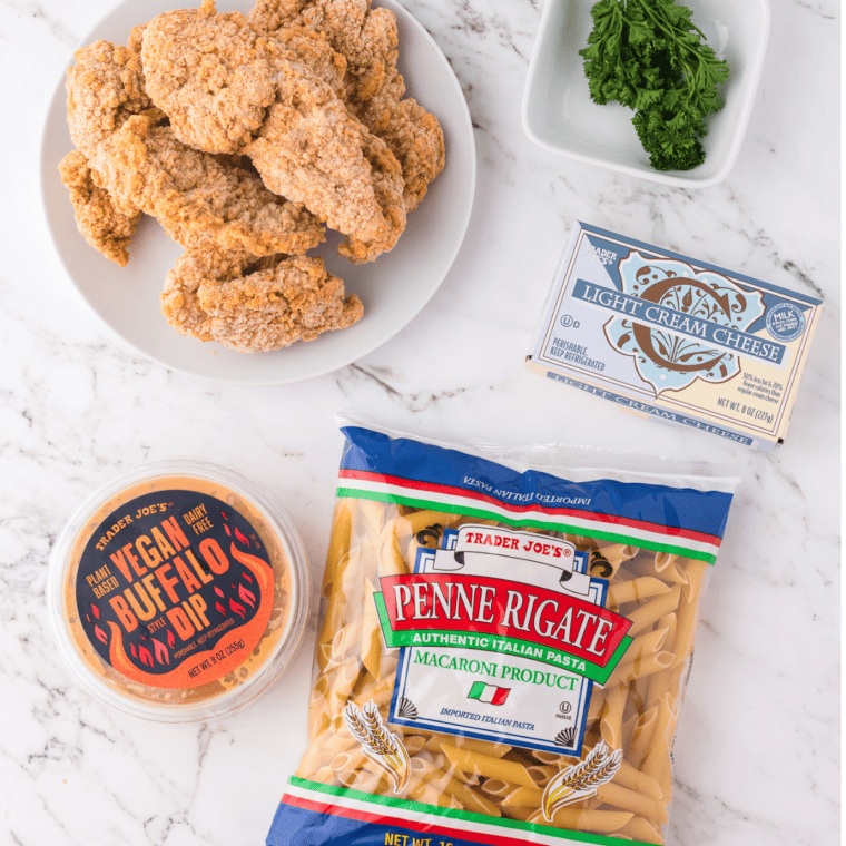 Ingredients needed for Air Fryer Buffalo Chicken Pasta on kitchen table.