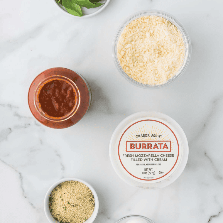 Ingredients needed for Air Fryer Burrata on kitchen table.