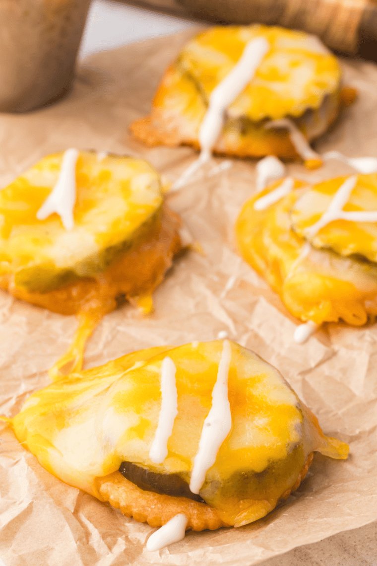 Cheesy Ritz Pickle Bites with pickles, Colby Jack cheese, and crispy Ritz crackers air fried to golden perfection.