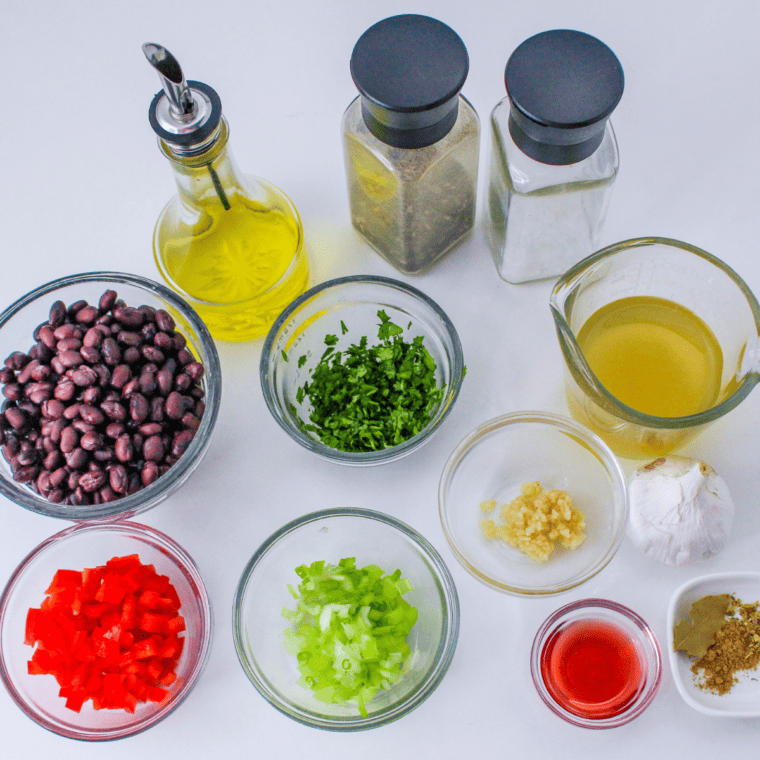 Ingredients needed for Copycat Chili’s Black Beans on kitchen table.