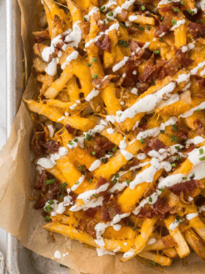 These Copycat Chili’s Texas Cheese Fries are loaded with crispy fries, melted cheese, crispy bacon, and a kick of jalapeños—just like the restaurant favorite!