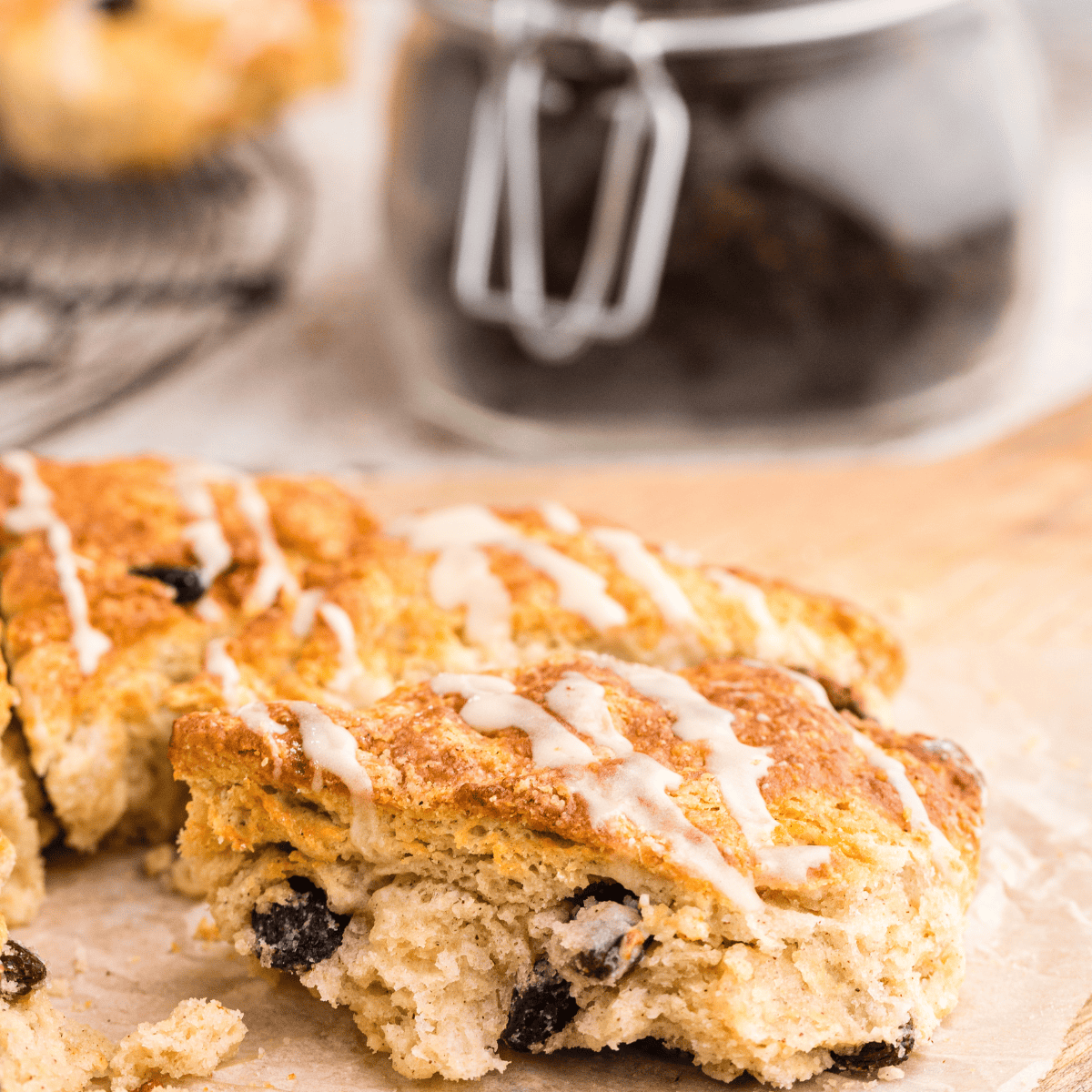 Homemade Hardee's-style cinnamon raisin biscuits, warm and golden with a sweet cinnamon swirl.