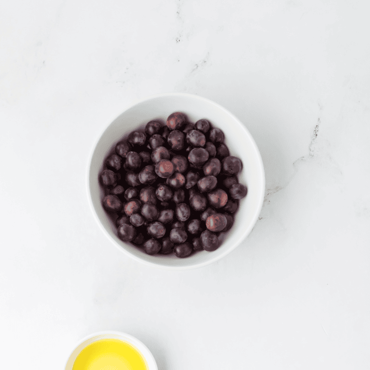 Ingredients needed for dehydrate Grapes on the kitchen table.