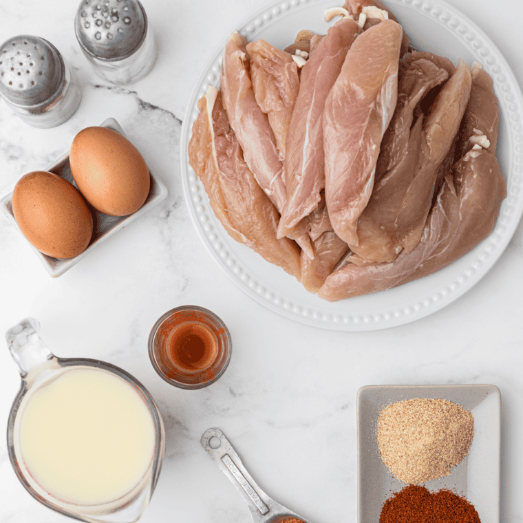 KFC Chicken Strips Recipe Ingredients on kitchen table.