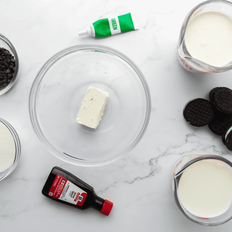 Ingredients needed for Ninja Creami Mint Oreo Blizzard on kitchen table.