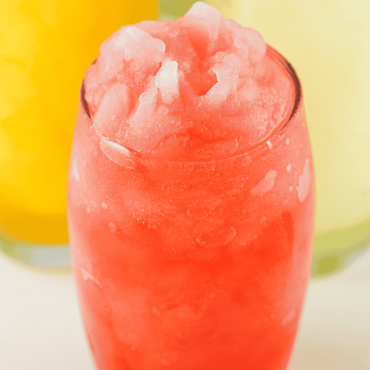 Homemade Red Robin Freckled Lemonade in a glass with strawberries