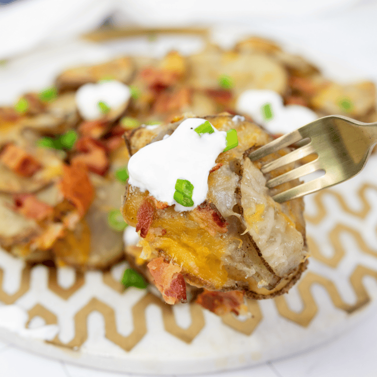 Crispy Blackstone potato chips with cheese and bacon, cooked and ready to store or serve