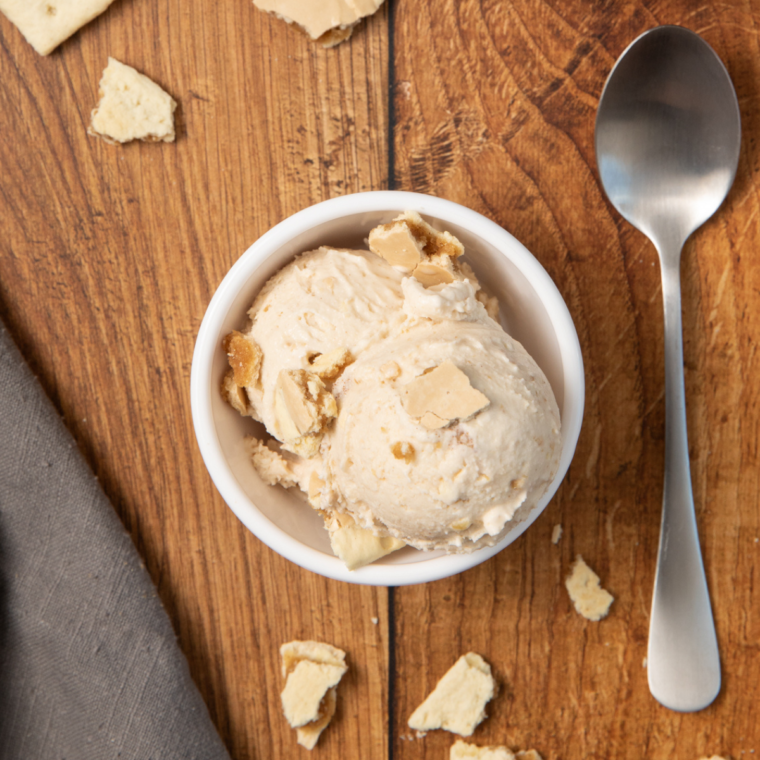 Scoop of Ninja Creami Brown Sugar Cinnamon Pop-Tarts ice cream topped with crumbled Pop-Tart pieces.