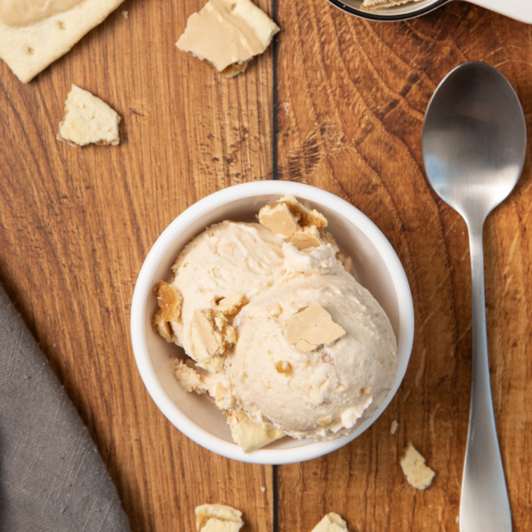Creamy brown sugar cinnamon ice cream topped with chopped Pop-Tarts in a bowl, ready to enjoy.