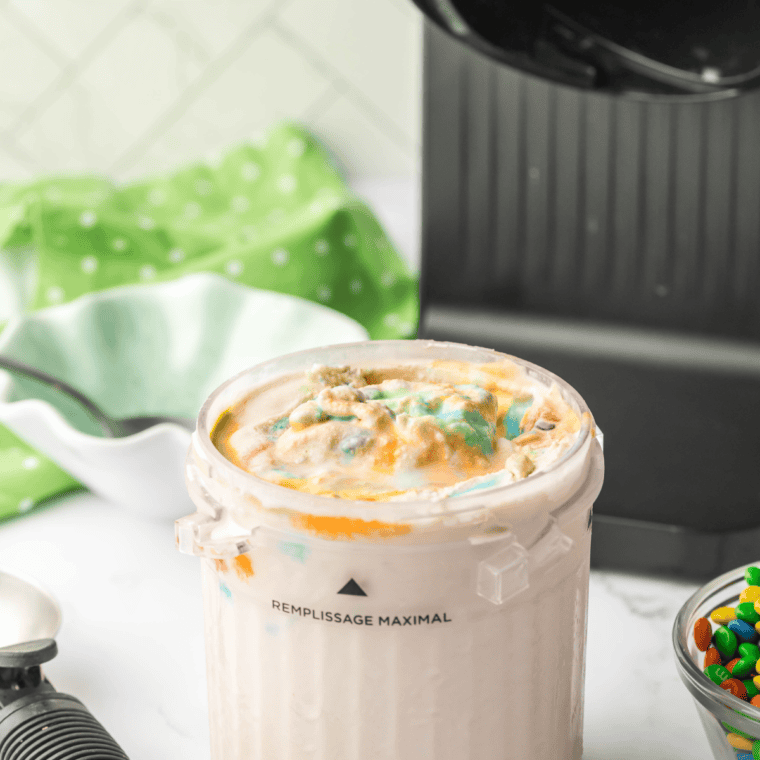 Bowl of Ninja Creami Sonic M&M Blast with colorful mini M&M’s mixed into creamy vanilla ice cream