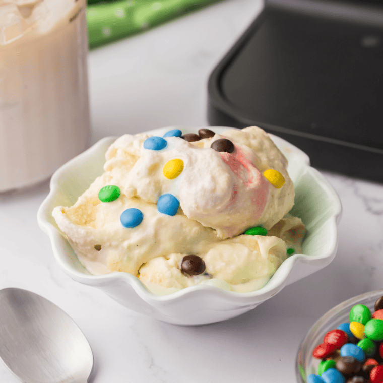 Creamy Ninja Creami Sonic M&M Blast swirled with colorful mini M&M candies in a bowl