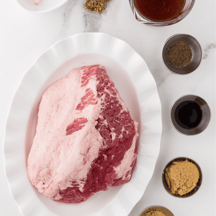 Ingredients needed for Slow Cooker Homemade Pastrami on kitchen table.