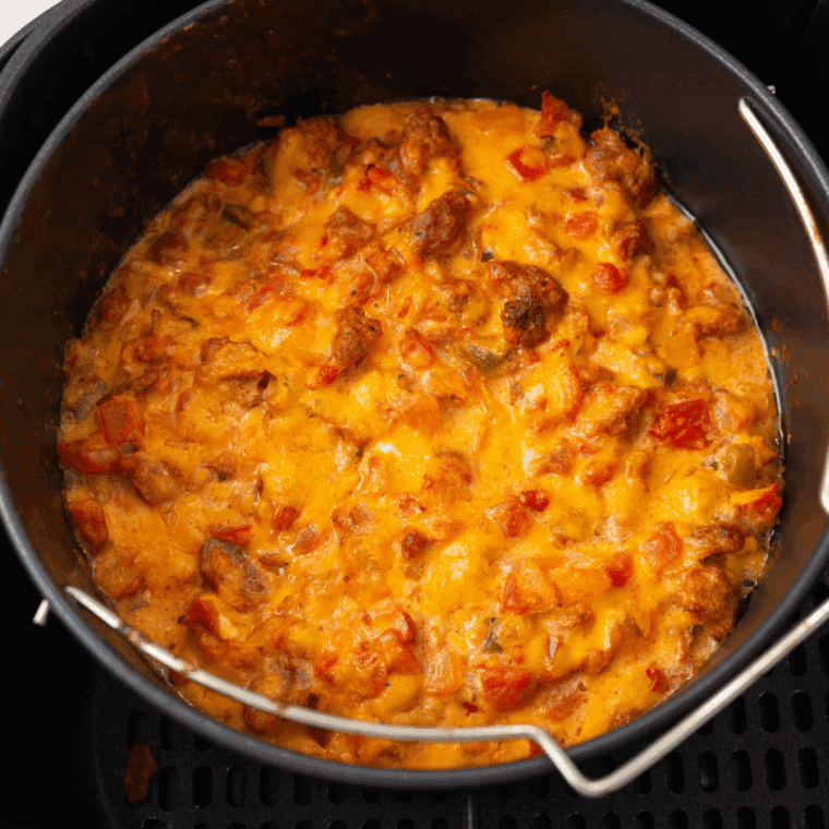 Air Fryer Chorizo Pimento Cheese Dip with chorizo, pimento cheese, and salsa.
