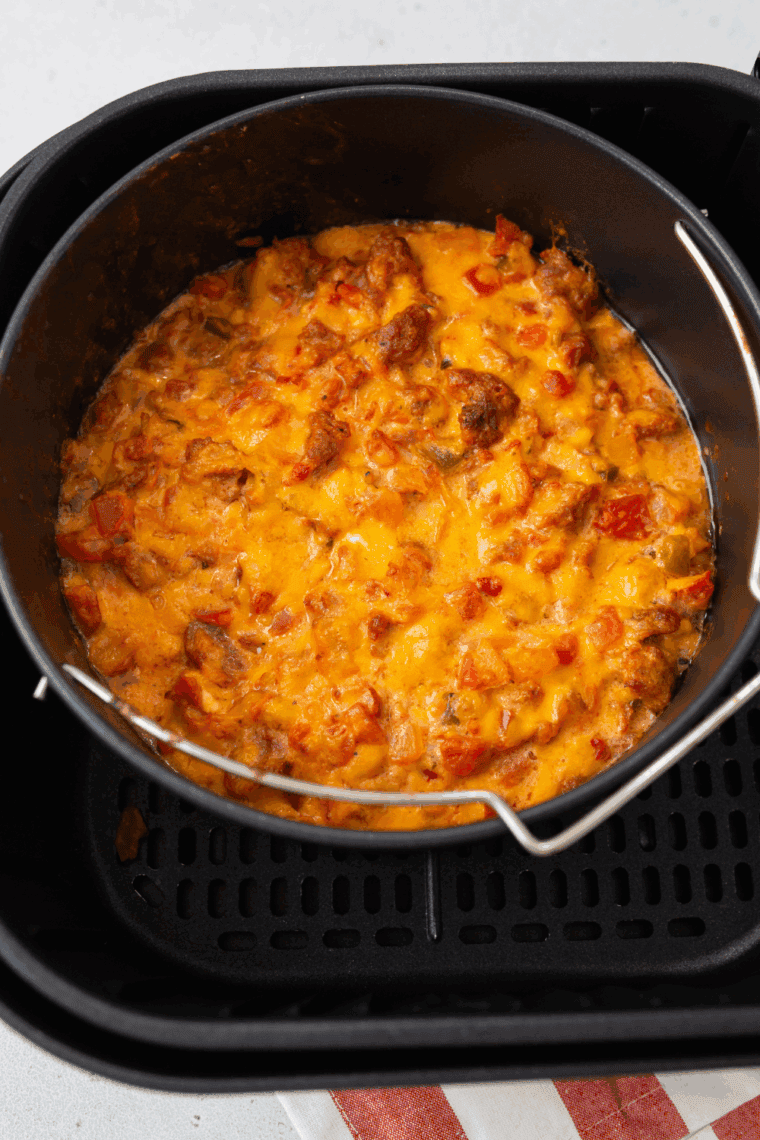 Air Fryer Chorizo Pimento Cheese Dip with chorizo, pimento cheese, and salsa.