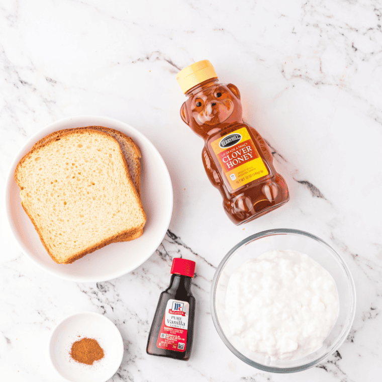 Ingredients needed for Air Fryer Cottage Cheese Toast on kitchen table.
