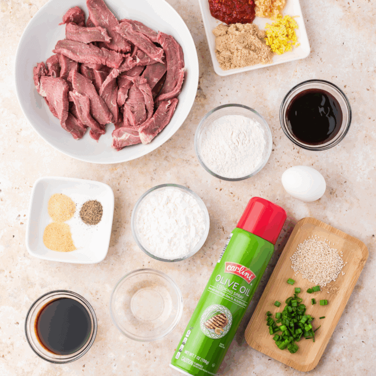 Ingredients needed for Air Fryer Crispy Beijing Beef on kitchen table.