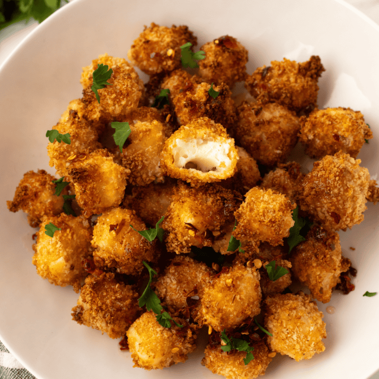 Air Fryer Crispy Halloumi Bites with a golden, crispy exterior and soft interior.