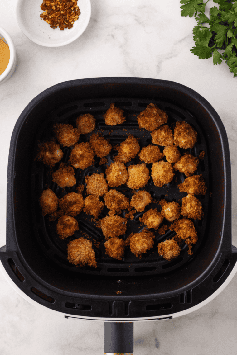 Crispy Air Fryer Halloumi Bites with a golden, crunchy exterior and soft interior.
