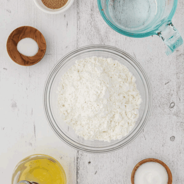 Ingredients needed for Air Fryer Gluten-Free Bread on kitchen table.