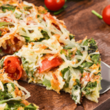 The Air Fryer Italian Frittata Recipe is a quick and easy dish packed with savory flavors. Made with eggs, fresh vegetables, and a blend of Italian seasonings, this frittata is cooked to perfection in the air fryer, giving it a crispy edge and a tender, fluffy center. It’s a versatile meal great for breakfast, brunch, or a light dinner, and can be customized with your favorite ingredients like cheese, spinach, or sausage.
