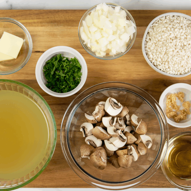 Ingredients needed for Air Fryer Risotto on kitchen table.