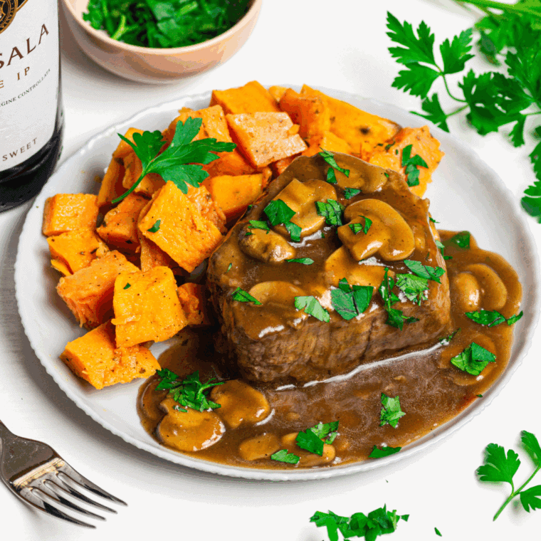 Air Fryer Steak Marsala with tender steak, mushrooms, and rich Marsala wine sauce.