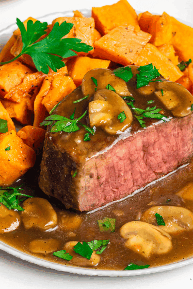 Air Fryer Steak Marsala with juicy steak, mushrooms, and a flavorful Marsala wine sauce.