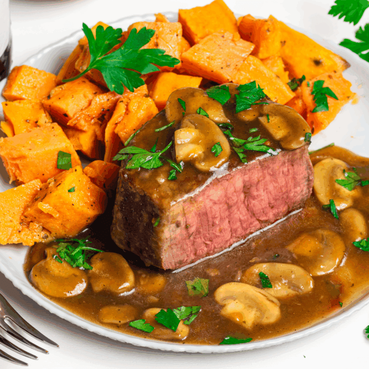 Air Fryer Steak Marsala with tender steak, mushrooms, and Marsala wine sauce.