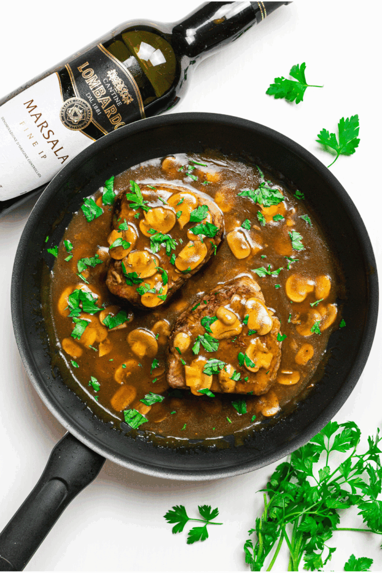 Air Fryer Steak Marsala with tender steak, mushrooms, and Marsala wine sauce.