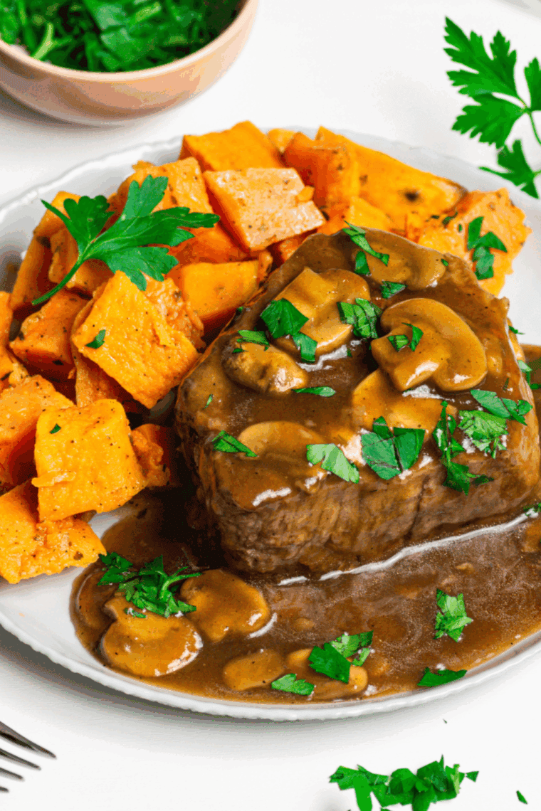 Air Fryer Steak Marsala with tender steak, mushrooms, and Marsala wine sauce.