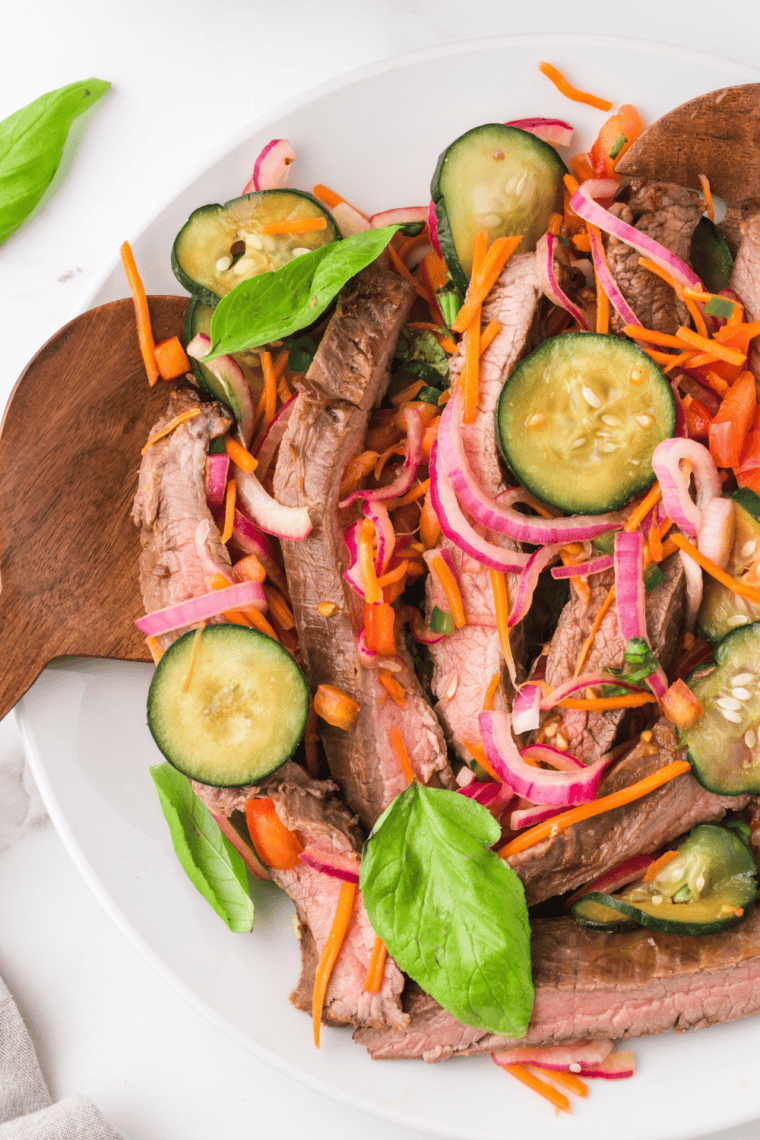Air Fryer Thai Beef Salad with tender beef, fresh vegetables, and Thai dressing.