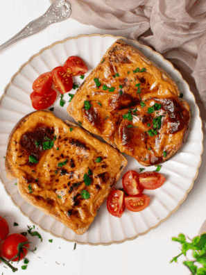 Air Fryer Welsh Rarebit with creamy cheese sauce on toast."