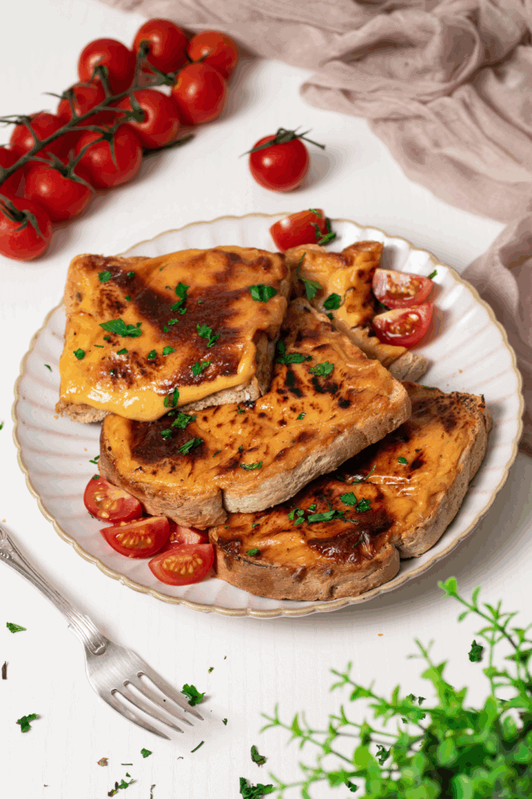 Air Fryer Welsh Rarebit with creamy cheese sauce on golden, crispy toast.
