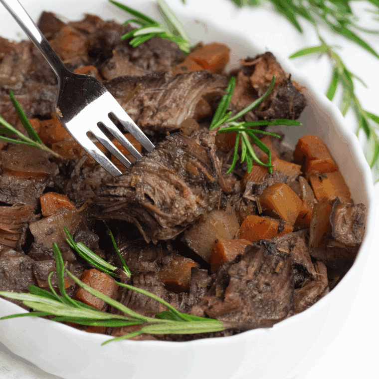 Air Fryer Yankee Pot Roast with tender, juicy meat and savory herbs.