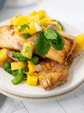 Blackstone Mahi Mahi with perfectly cooked, tender fish on the griddle.