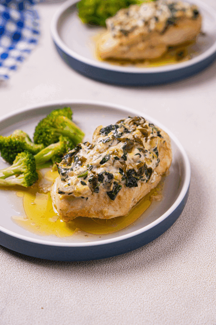 Golden, juicy Bonefish Grill Copycat Lily's Chicken topped with lemon basil sauce and garnished with fresh herbs.