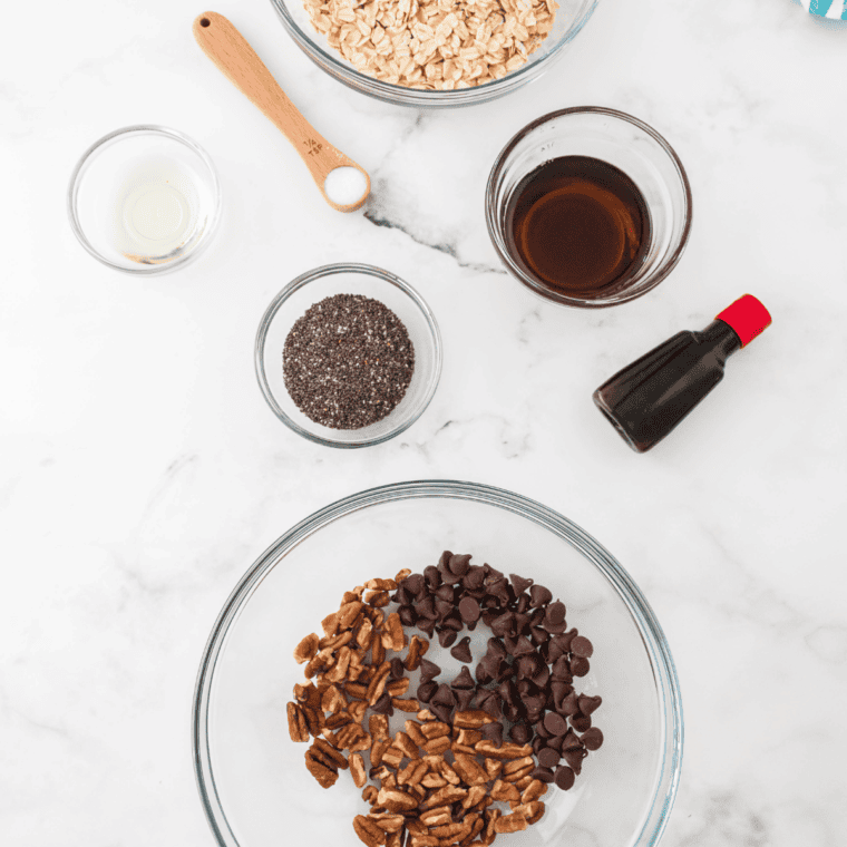 Ingredients needed for Chocolate Chip Cookie Granola (Purely Elizabeth Copycat) on kitchen table.